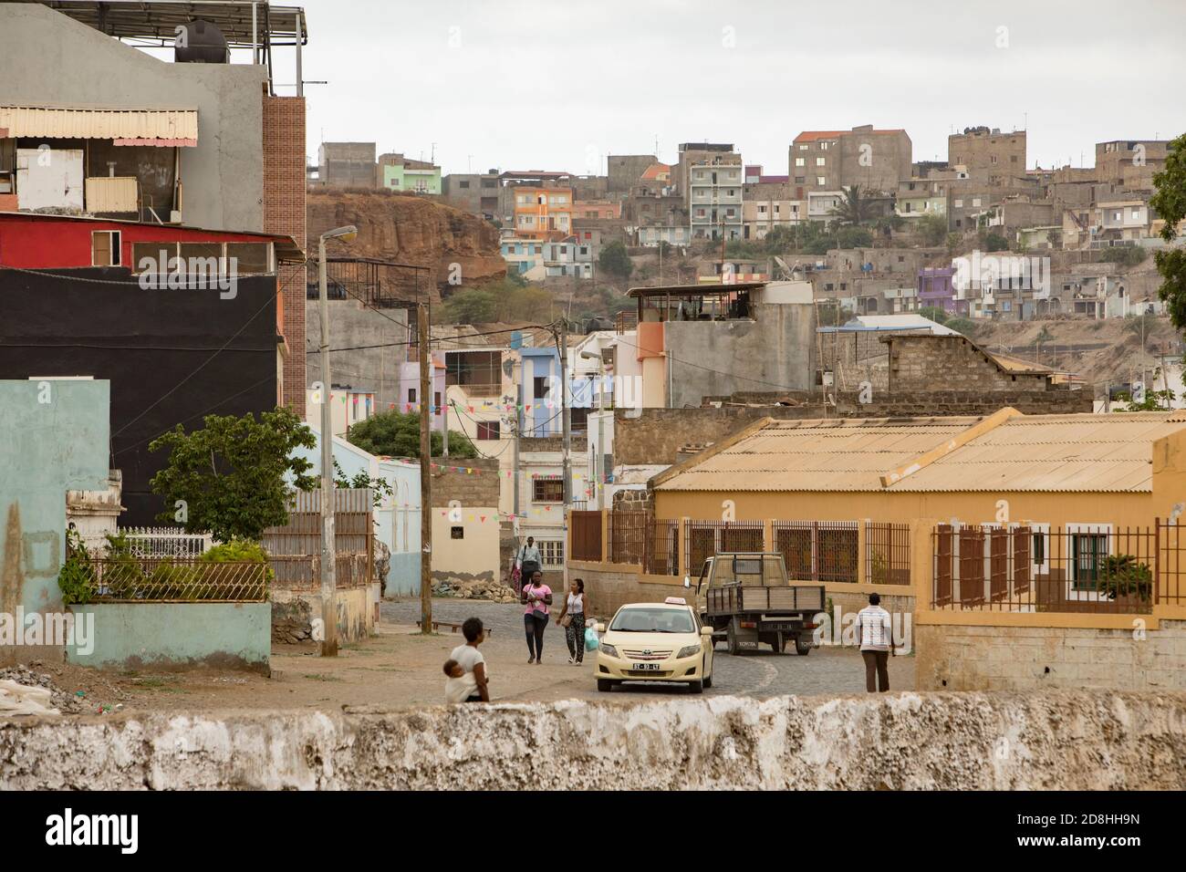 Low neighborhoods with homes and apartment buildings in Praia