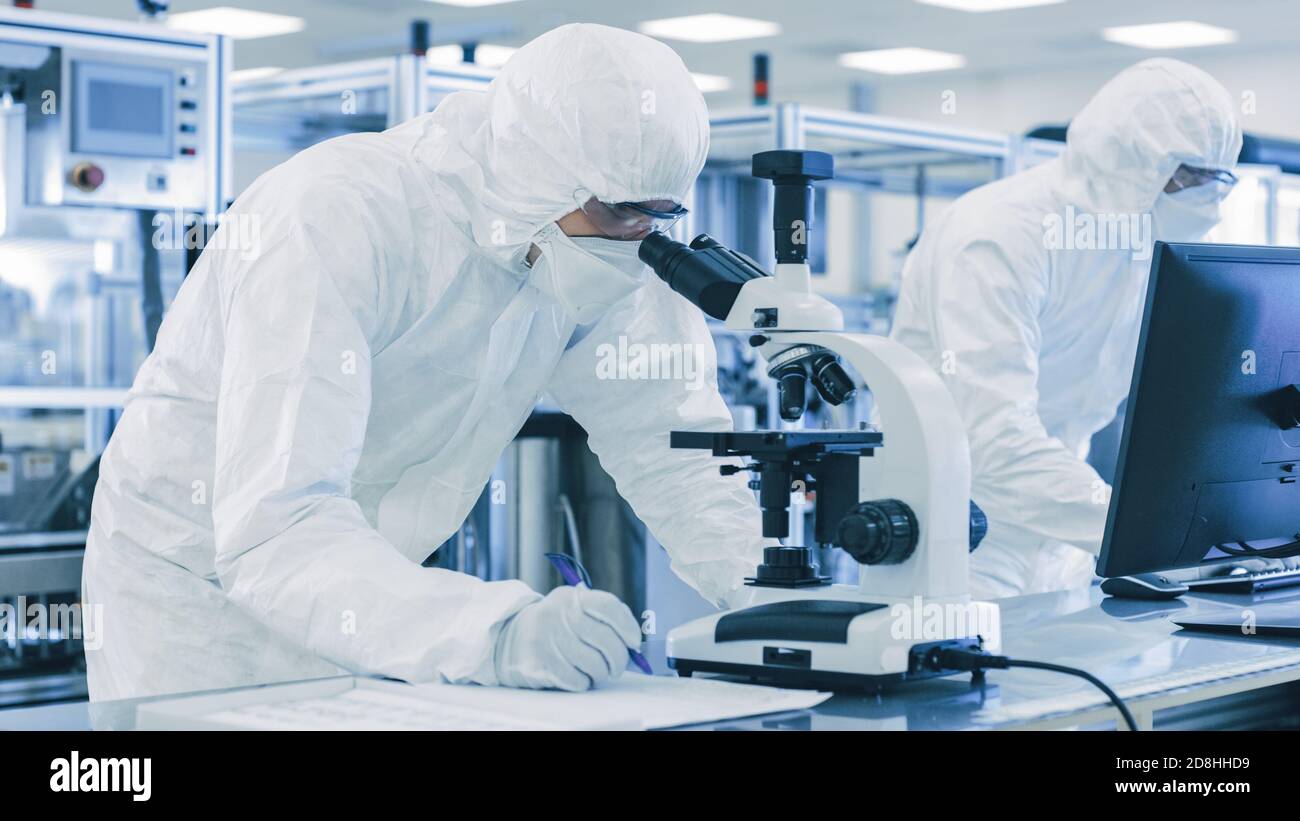 Scientists Using Technology Scientists using modern computer technology hi-res stock photography ...