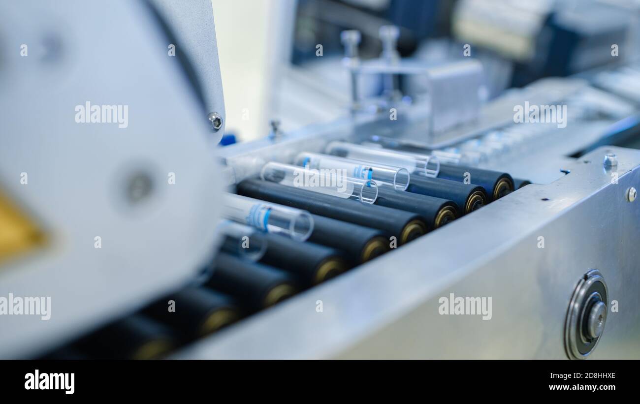 Closeup Footage of the Industrial Manufacturing Medical Test Tubes