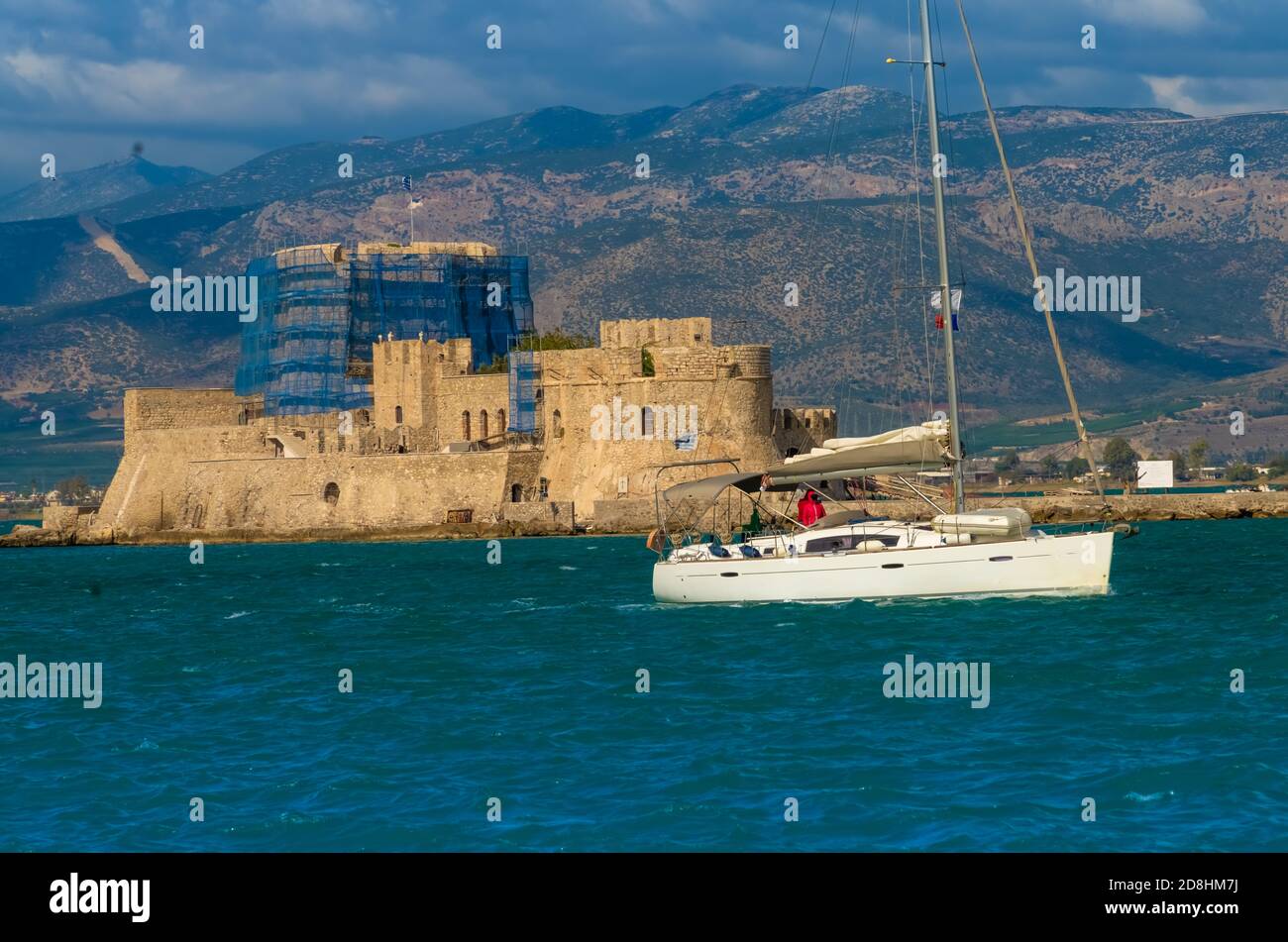 The ruins of the water castle of Bourtzi , a Venetian castle located in the  middle of the harbour of Nafplio, Peloponnese, Greece Stock Photo - Alamy