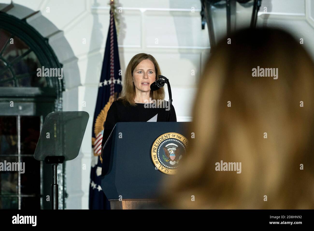 Supreme Court Associate Justice Amy Coney Barrett delivers remarks during her swearing in ceremony on the South Lawn of the White House October 26, 2020 in Washington, DC. Stock Photo