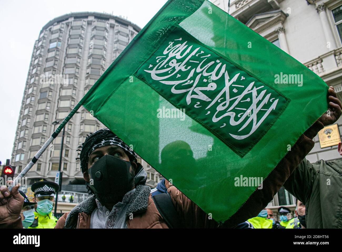 LONDON,UK  30 October 2020. British Muslims gather after noon Friday outside the French embassy during a tide of  rising muslim anger against the comments made by French President Emmanuel Macron who has defended the country's  right to publish the  cartoons of the Prophet Muhammad following beheadings, in Paris and Nice by radical islamists.Credit: amer ghazzal/Alamy Live News Stock Photo