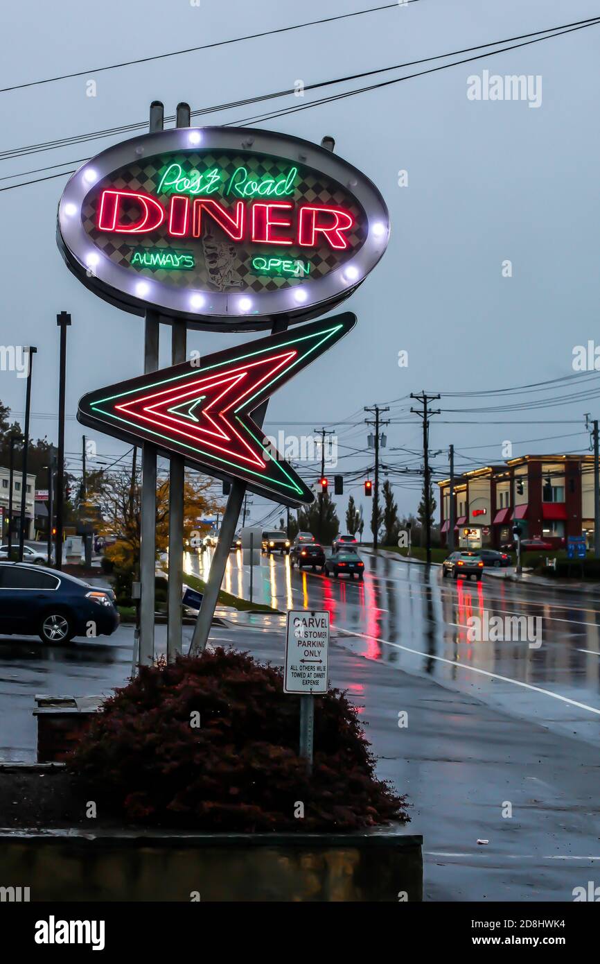 NORWALK, CT, USAOCTOBER 30, 2020 Postal Road Diner in rainy October morning with street