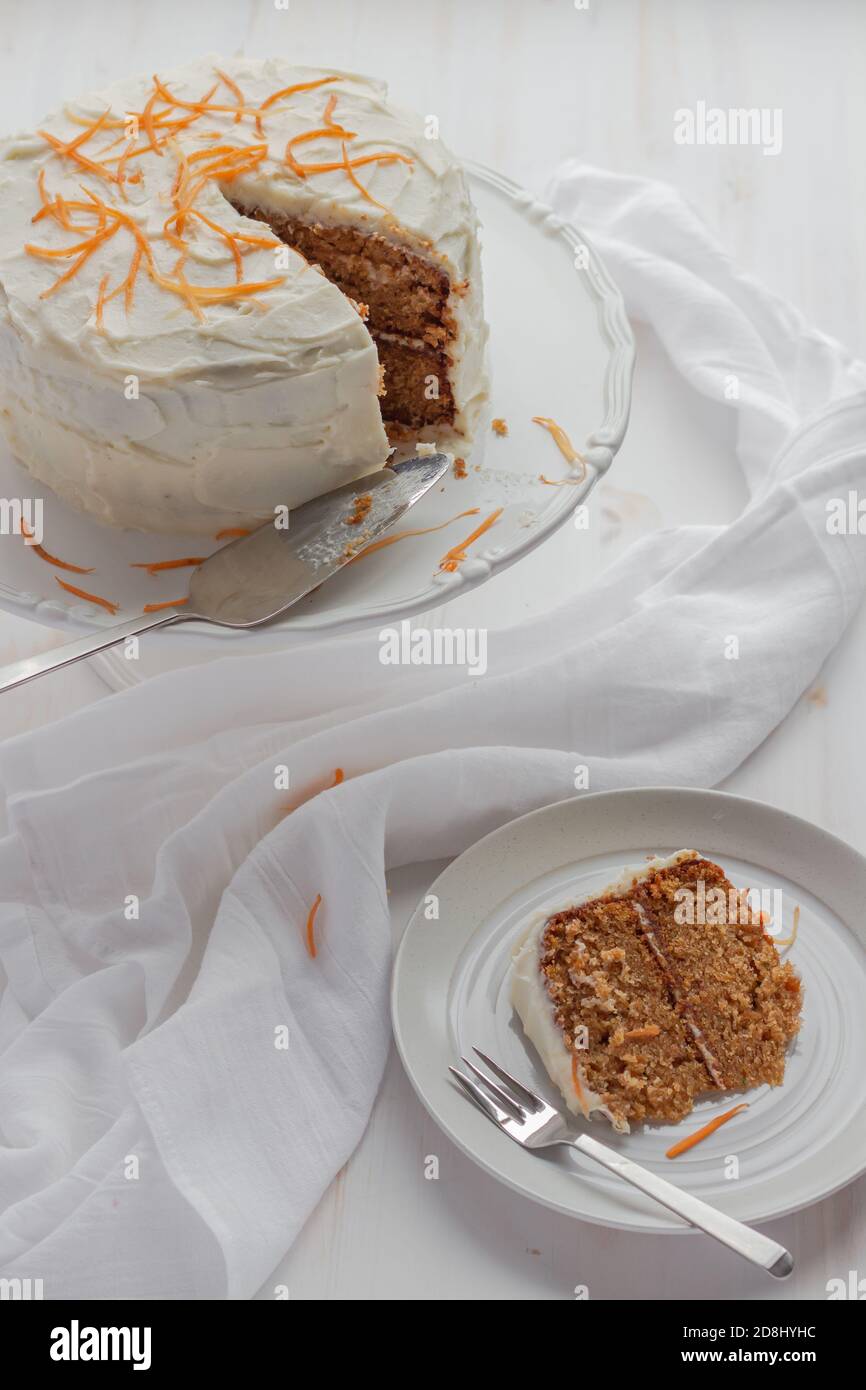 Home baked carrot cake with cream cheese frosting Stock Photo Alamy
