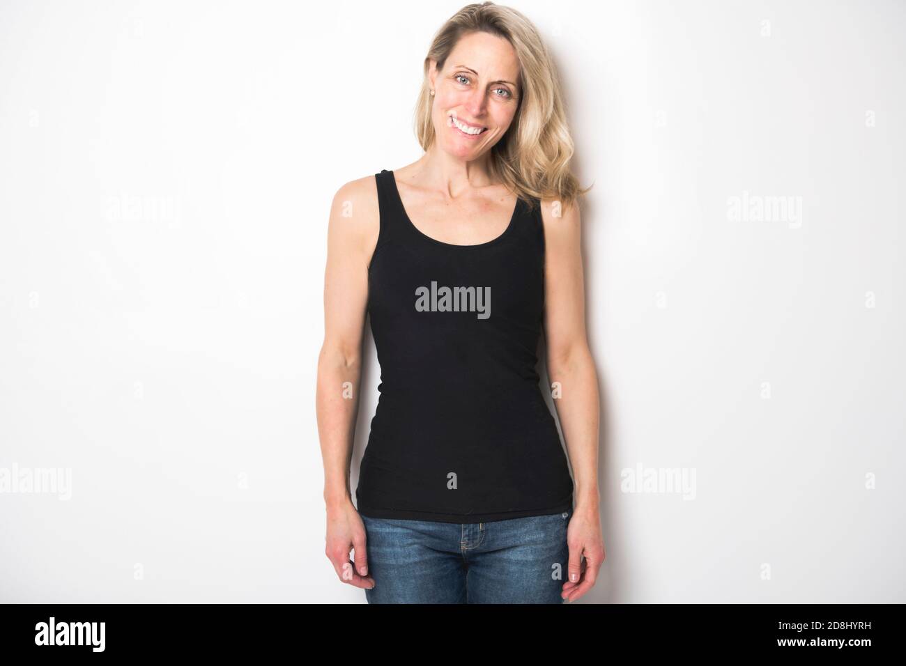 Woman in grey tank top hi-res stock photography and images - Alamy