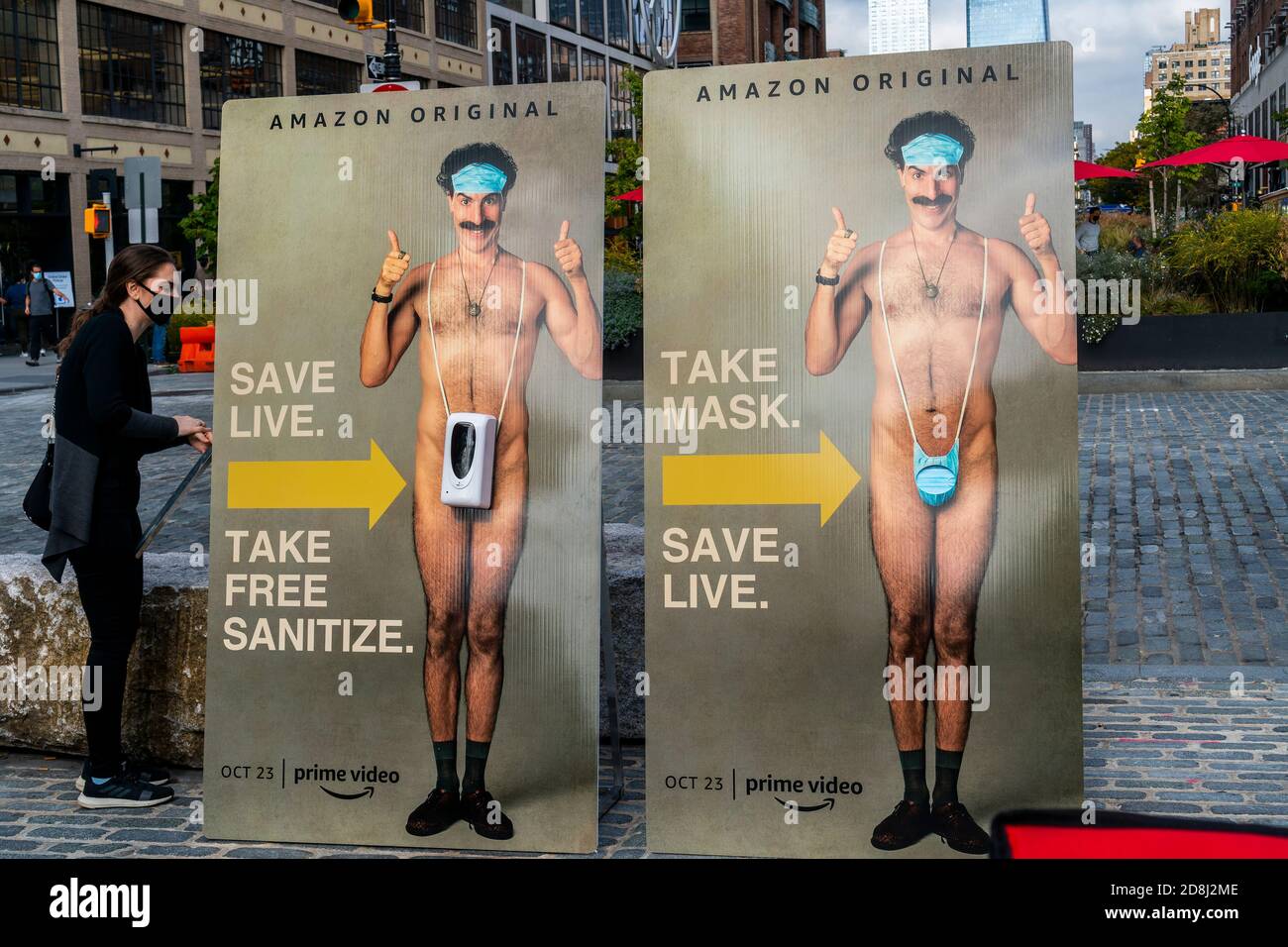 Workers prepare to pack up a hand sanitizer/mask give away brand activation for “Borat Subsequent Moviefilm” in the Meatpacking District in New York on Friday, October 23, 2020. The Sacha Baron Cohen film premieres today on Amazon Prime. (© Richard B. Levine) Stock Photo