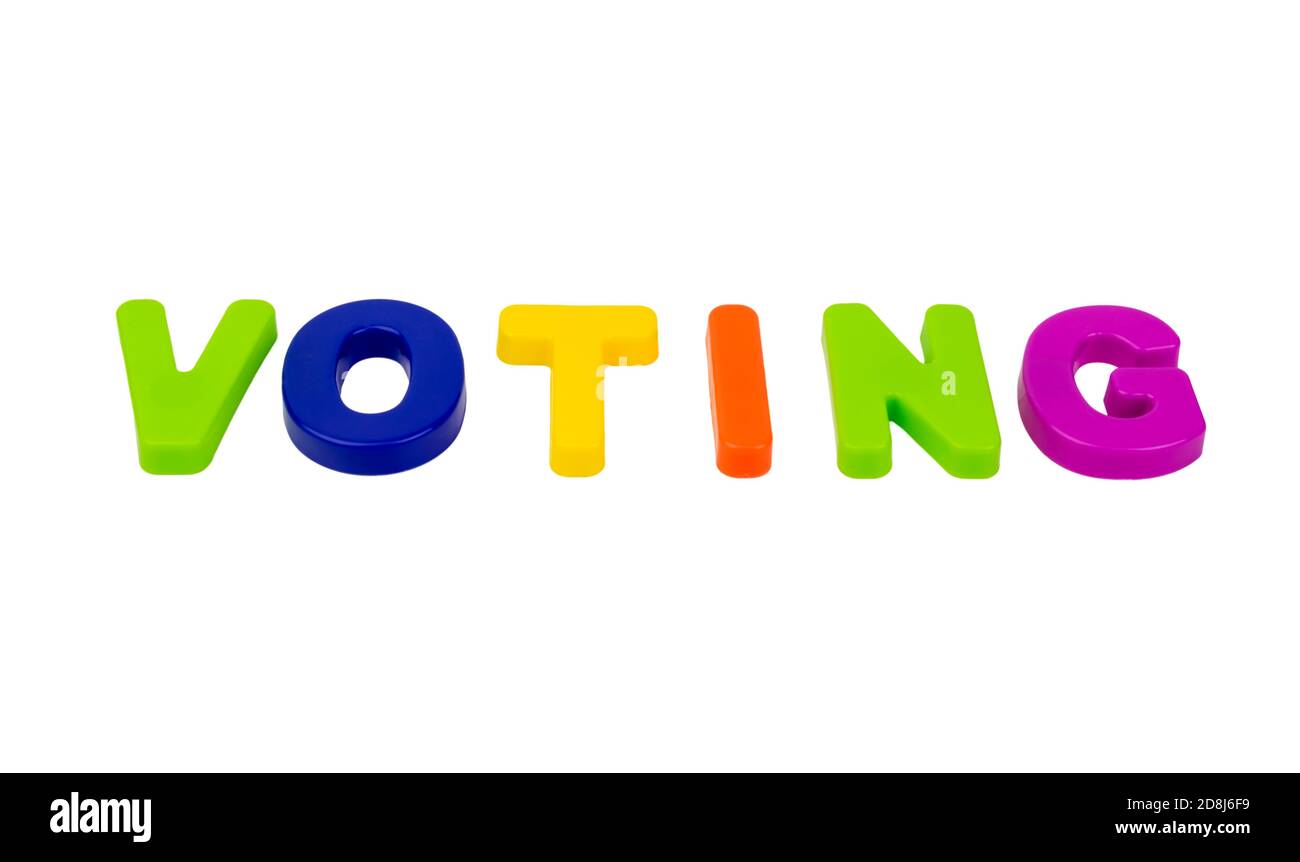 Text VOTING written in plastic letters on a white background. Concept ...