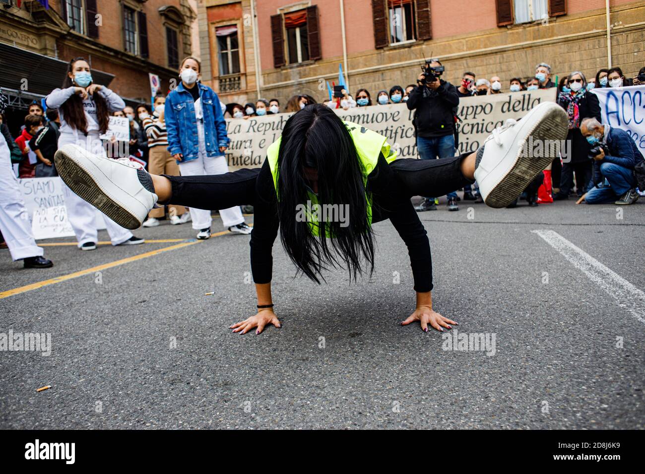 Bologna, Italy. 30th Oct, 2020. Theater workers, dancers and people working in the culture and entertainment sector attend a protest against the new lockdown measures for Covid-19 pandemic, on October 30, 2020 in Bologna, Italy. Credit: Massimiliano Donati/Alamy Live News Stock Photo