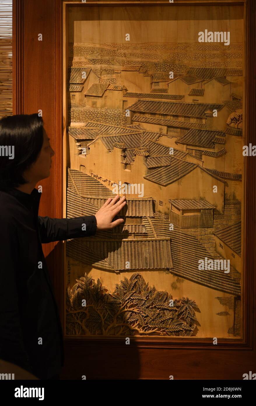 1030 Dongyang Oct 30 Xinhua Chen Guohua A Provincial Level Master Of Arts And Crafts Examines A Piece Of His Woodcarving Artwork At His Studio In Dongyang East China S 1030 Dongyang Oct 30 Xinhua Chen Guohua A Provincial Level Master Of Arts And Crafts Examines A Piece Of His Woodcarving Artwork At His Studio In Dongyang East China S
