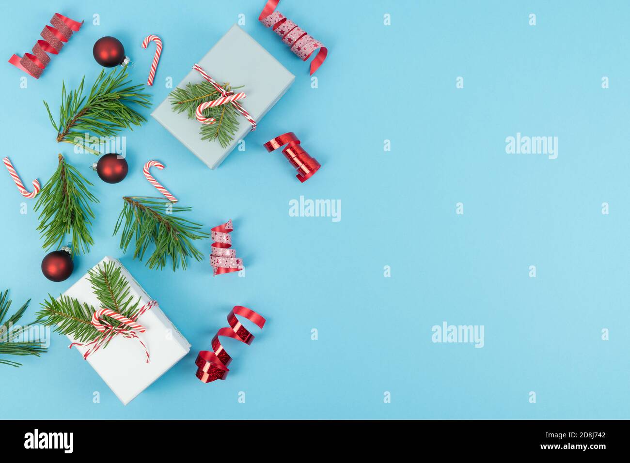 Various Christmas decorations on a blue background. Copy space. Stock Photo