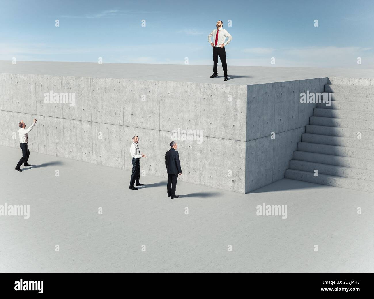 business people in front of a concrete wall, one of them finds the solution and uses the stairs. Concept of resourcefulness and problem solving. Stock Photo