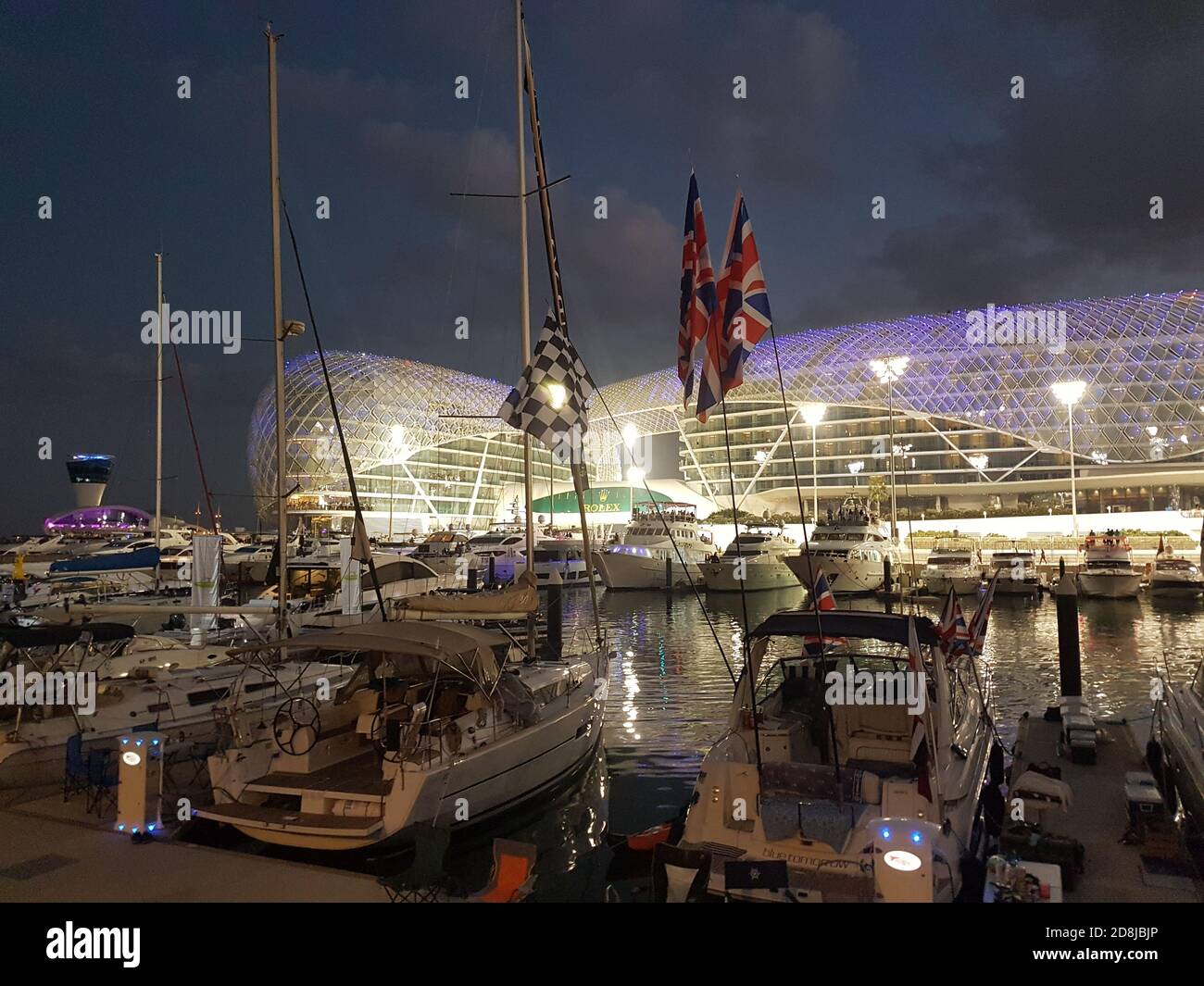 The yachts with British flags docked in Yas Marina in front of Yas