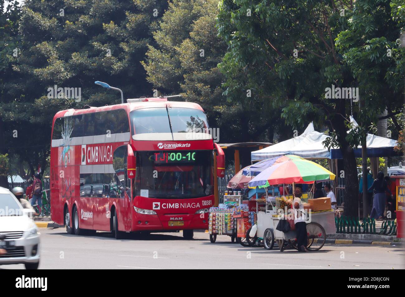 Jakarta / Indonesia - 23 September 2020. Two-level red tourism buses provided free by the Jakarta provincial government for visitors to go around Jaka Stock Photo