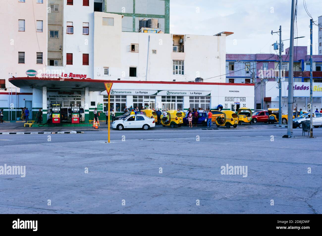 Cars waiting to refuel at the gas station. The blockade of Cuba causes fuel shortages. La Habana - La Havana, Cuba, Latin America and the Caribbean Stock Photo