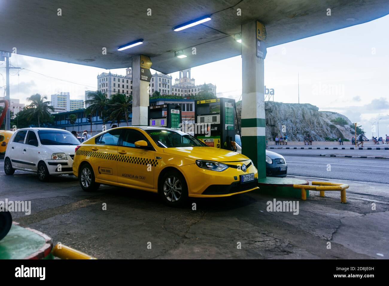 Taxi, car of Chinese origin, refuel at a gas station. La Habana - La Havana, Cuba, Latin America and the Caribbean Stock Photo