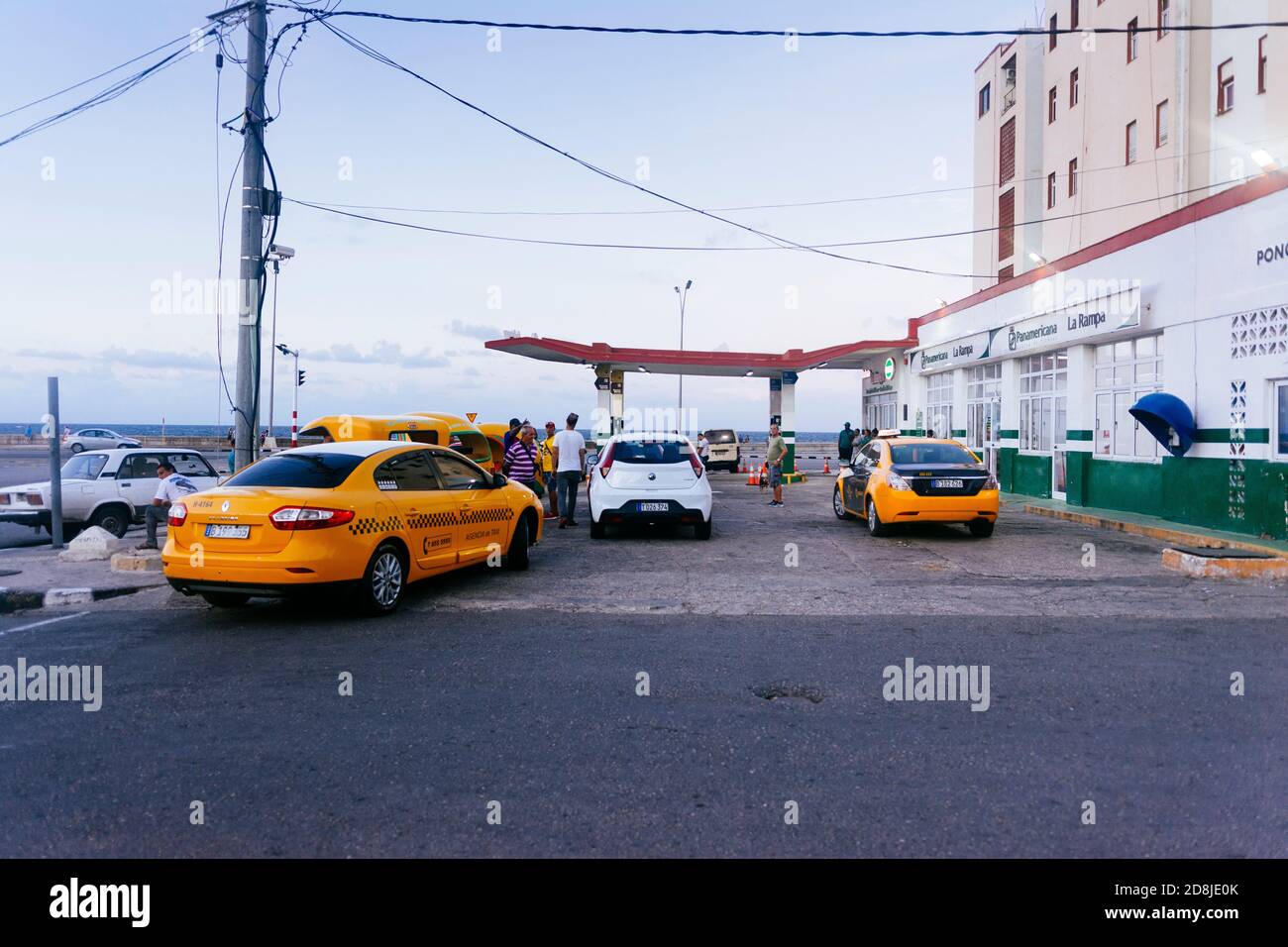 Cars waiting to refuel at the gas station. The blockade of Cuba causes fuel shortages. La Habana - La Havana, Cuba, Latin America and the Caribbean Stock Photo