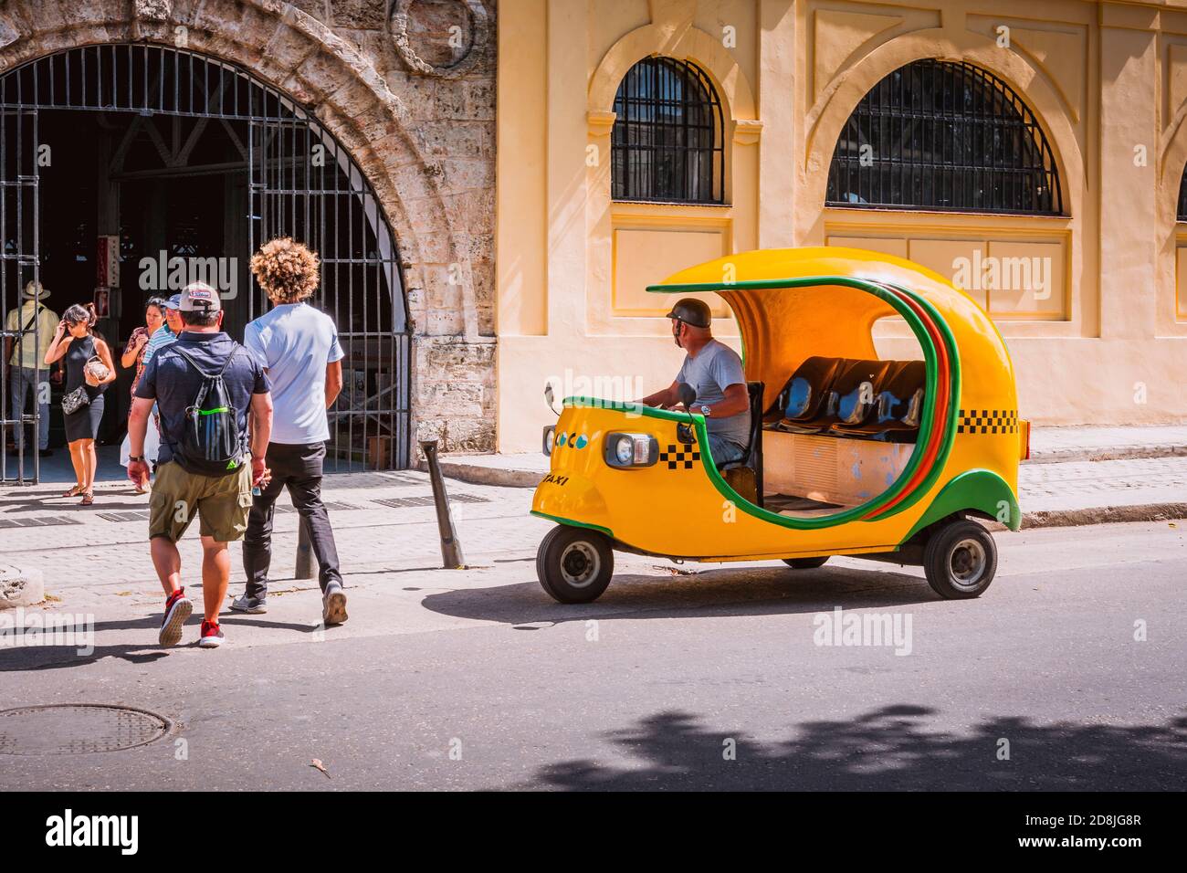 Coco-Taxi near Almacenes San José Artisans' Market. La Habana - La Havana, Cuba, Latin America and the Caribbean Stock Photo