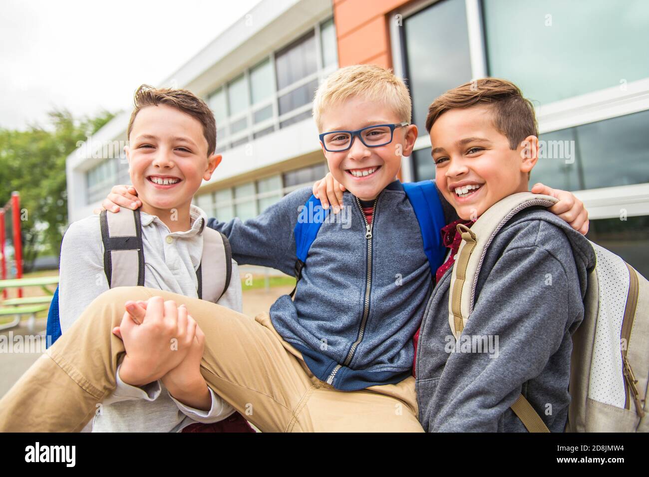 group of kids on the school background having fun Stock Photo