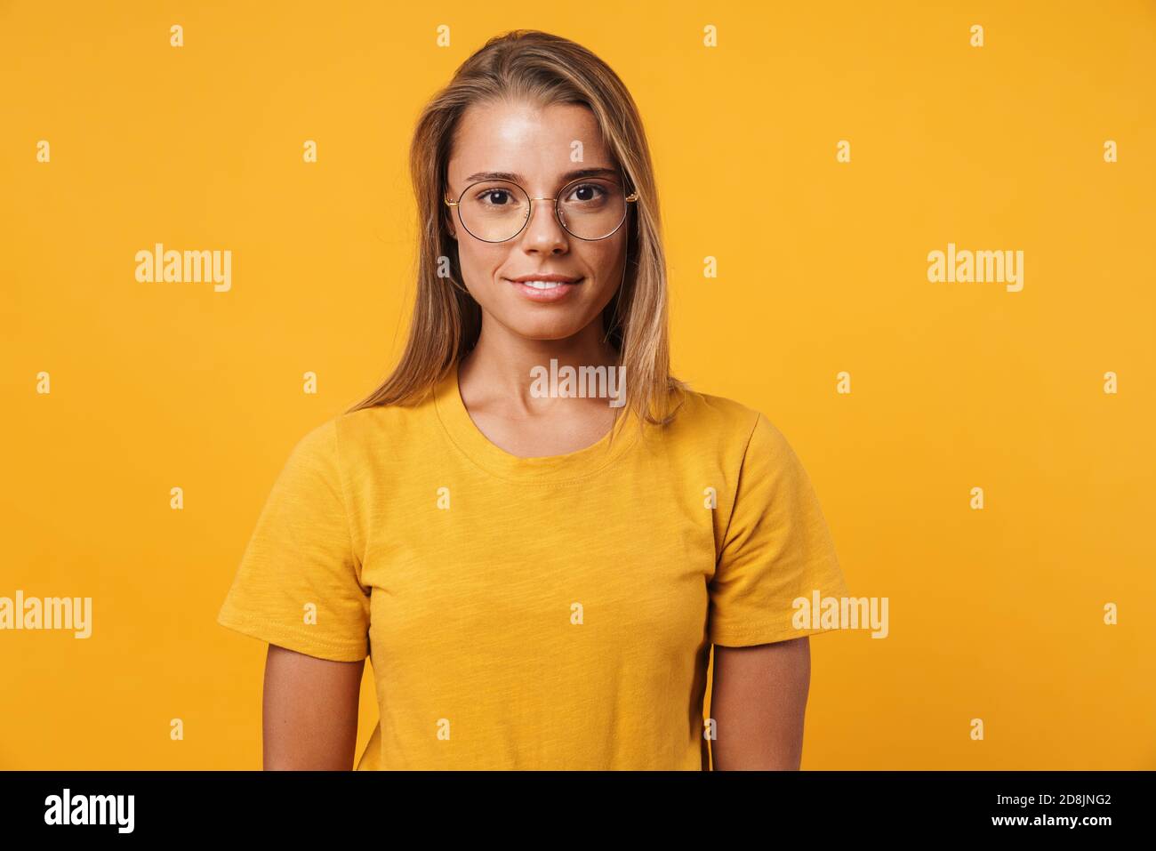 Image of blonde pleased woman in eyeglasses posing and looking at ...