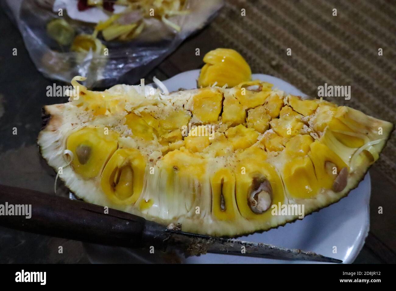 Yellow jackfruit slices are ready to be enjoyed, selective focus Stock Photo