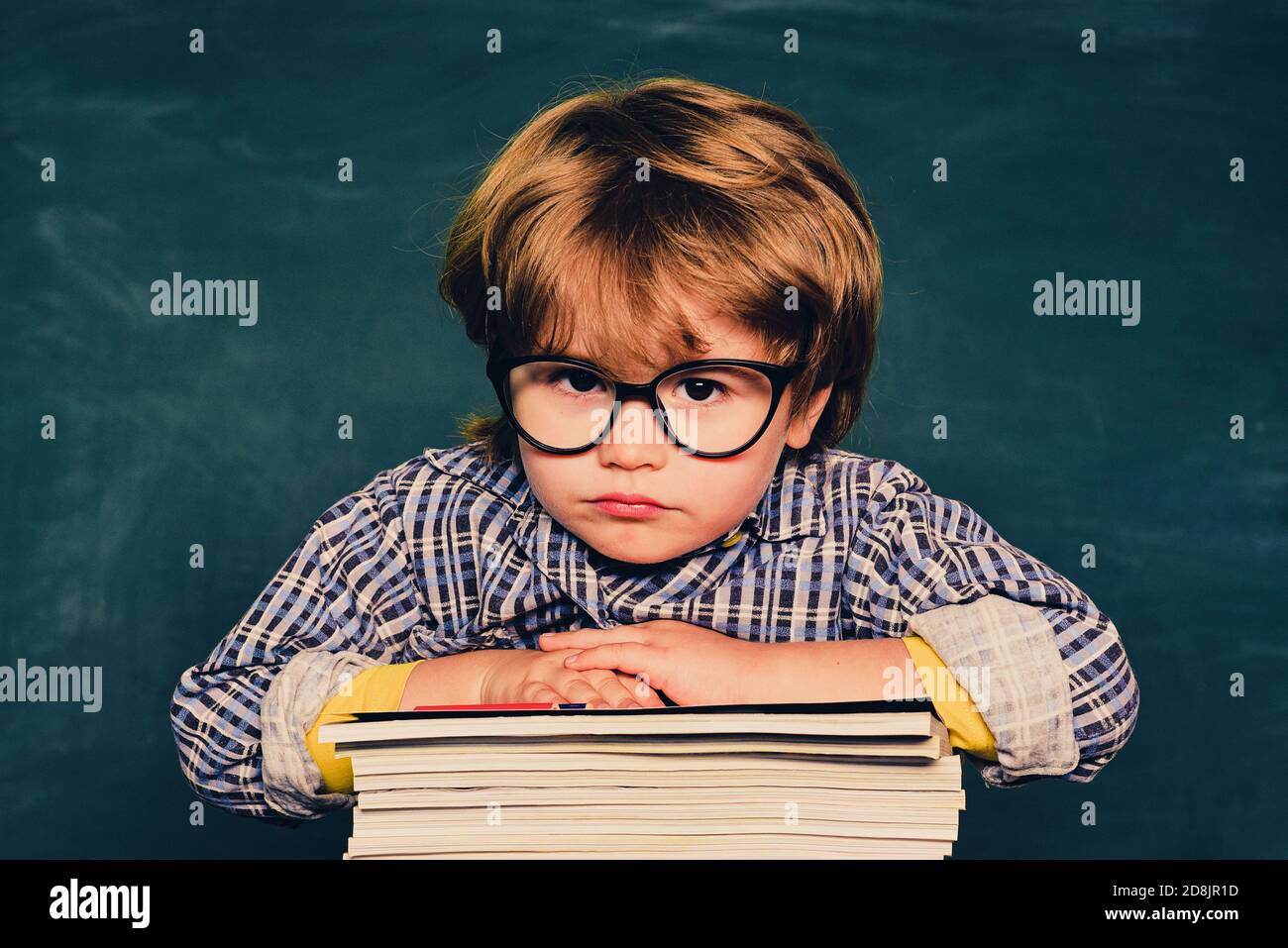 Elementary school. Education. Back to school. Schoolkid or preschooler getting bullied in school. School bullying. Science education concept. Stock Photo