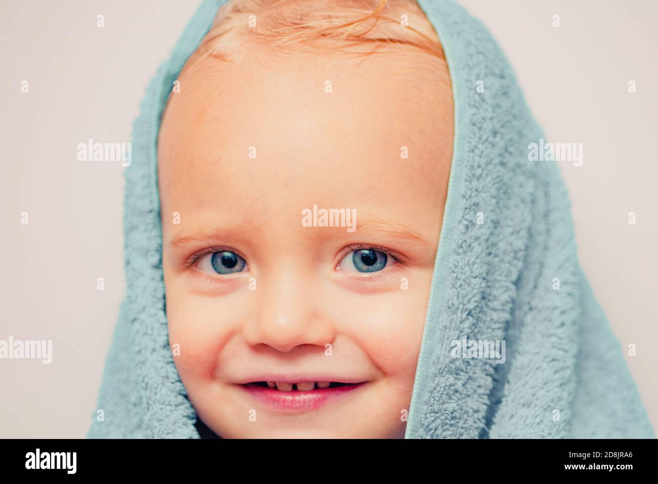 Purity and hygiene education. Child in clean and dry towel. Happy bath time. Image of cute baby