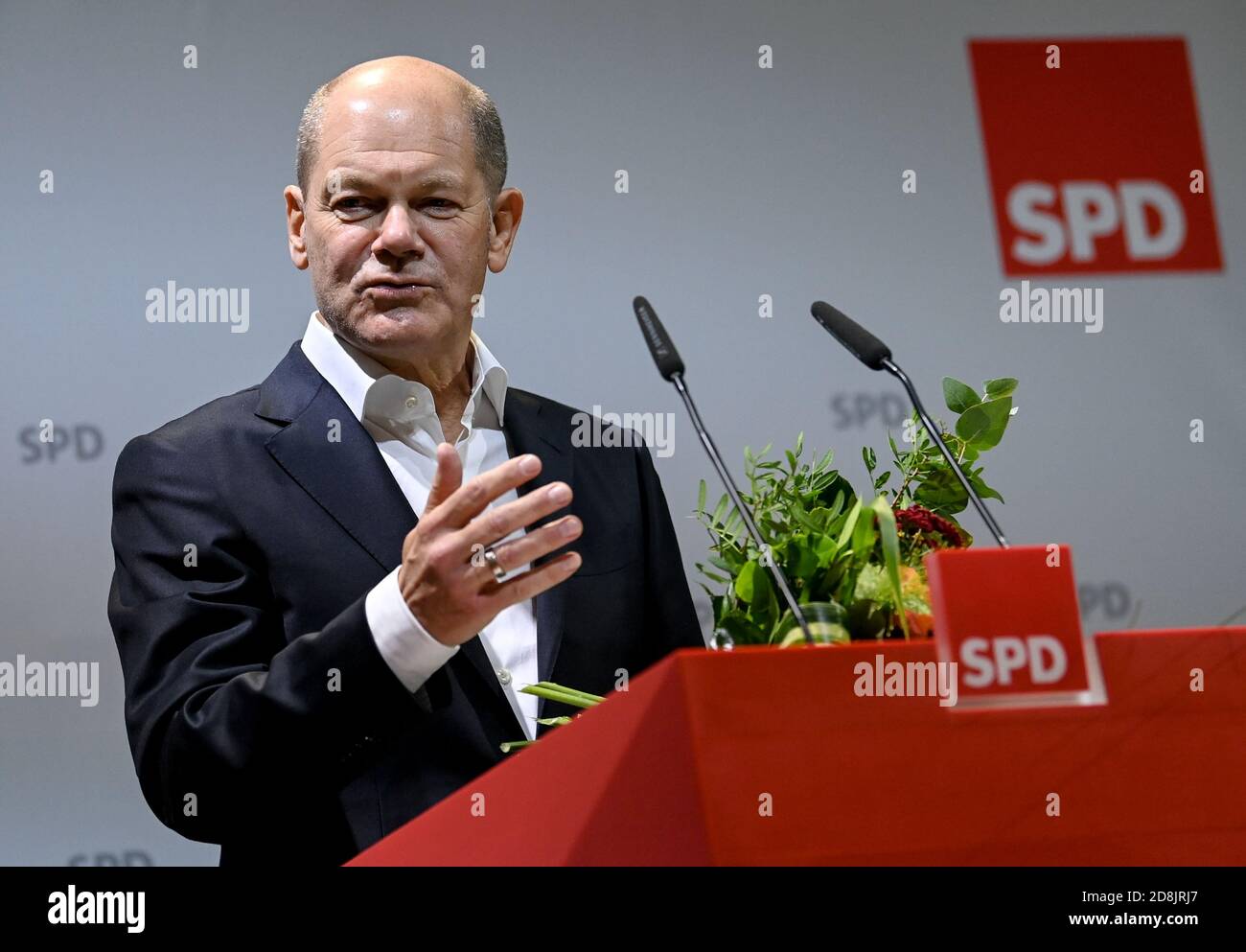 Ludwigsfelde, Germany. 30th Oct, 2020. Olaf Scholz (SPD), candidate for the chancellorship, is pleased at the constituency conference of the Brandenburg SPD about the election of the direct candidate for the constituency 061 for the Bundestag election. Credit: Britta Pedersen/dpa-Zentralbild/dpa/Alamy Live News Stock Photo