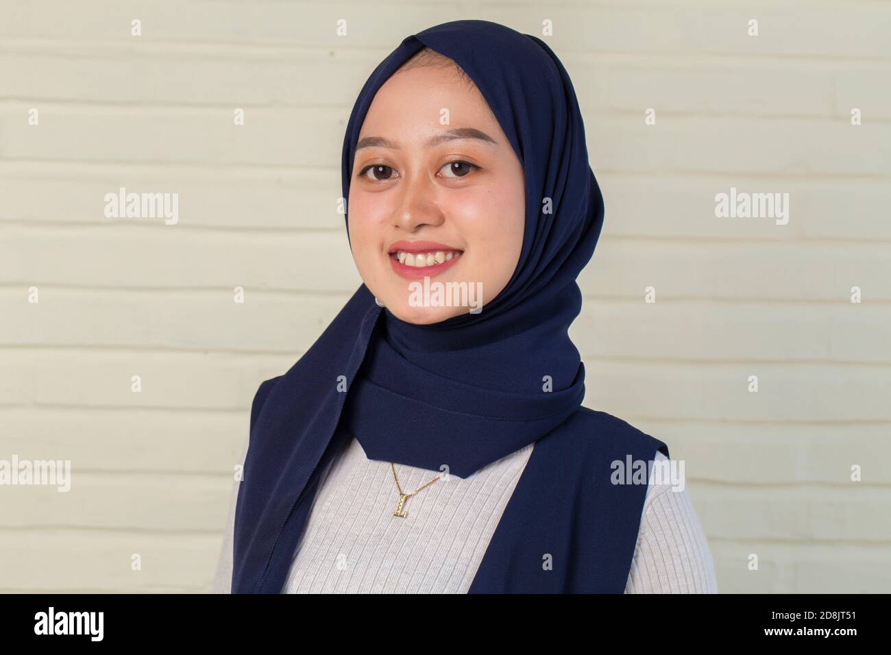 Young asian muslim woman in head scarf smile Stock Photo - Alamy