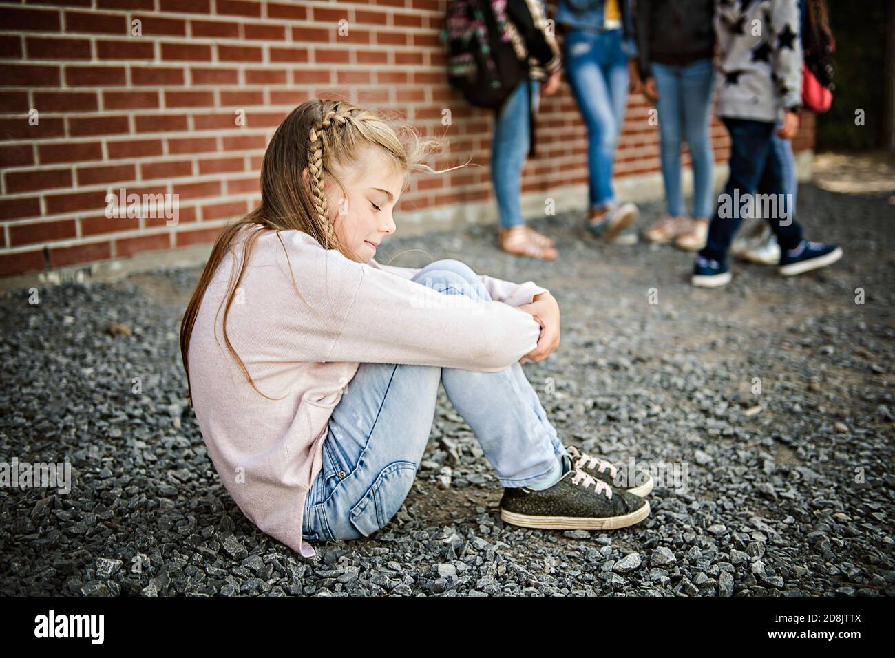 sad intimidation moment Elementary Age Bullying in Schoolyard Stock ...