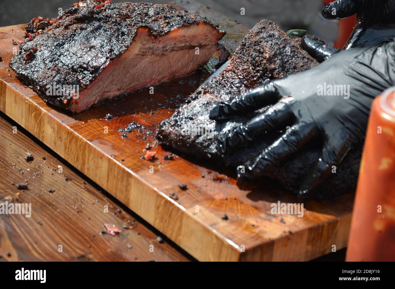 a big piece of freshly prepared grilled meat the chef cuts. Fresh grilled  meat. Grilled beef steak medium rare on wooden cutting board Stock Photo -  Alamy