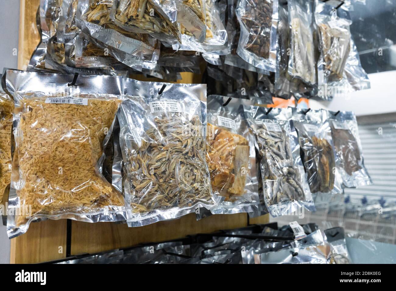 Showcase with dried fish at a grocery store Stock Photo Alamy