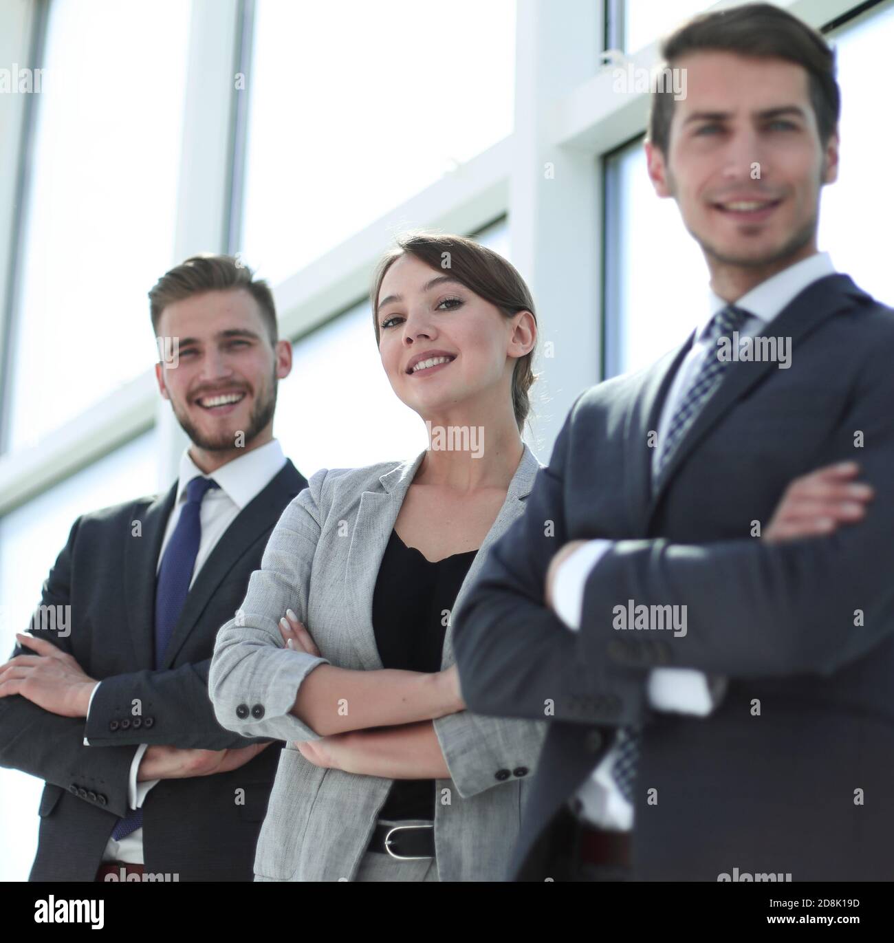 confident business team standing together Stock Photo - Alamy