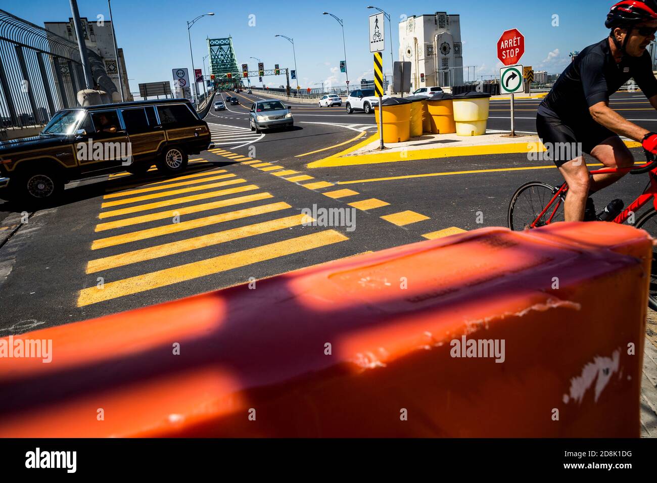 Traffic at a zebra crossing (crosswalk) on the Jacques Cartier Bridge