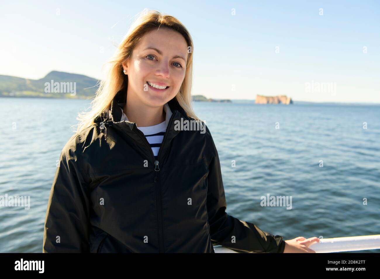 tourist woman enjoying Perce Rock view from Gaspe in Quebec Stock Photo ...