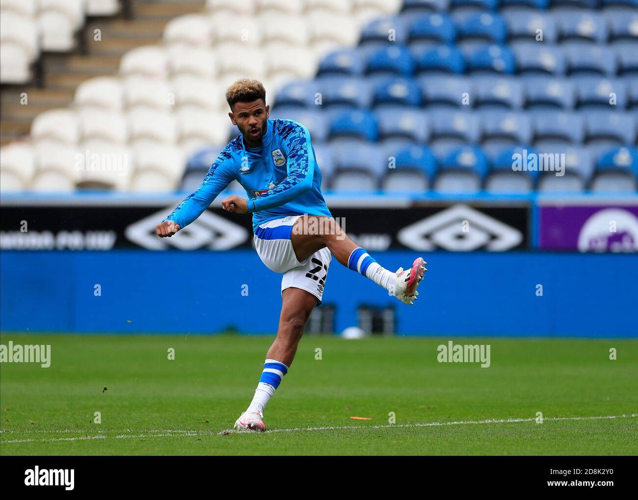 Fraizer Campbell (22) of Huddersfield Town warms up for the game Stock ...