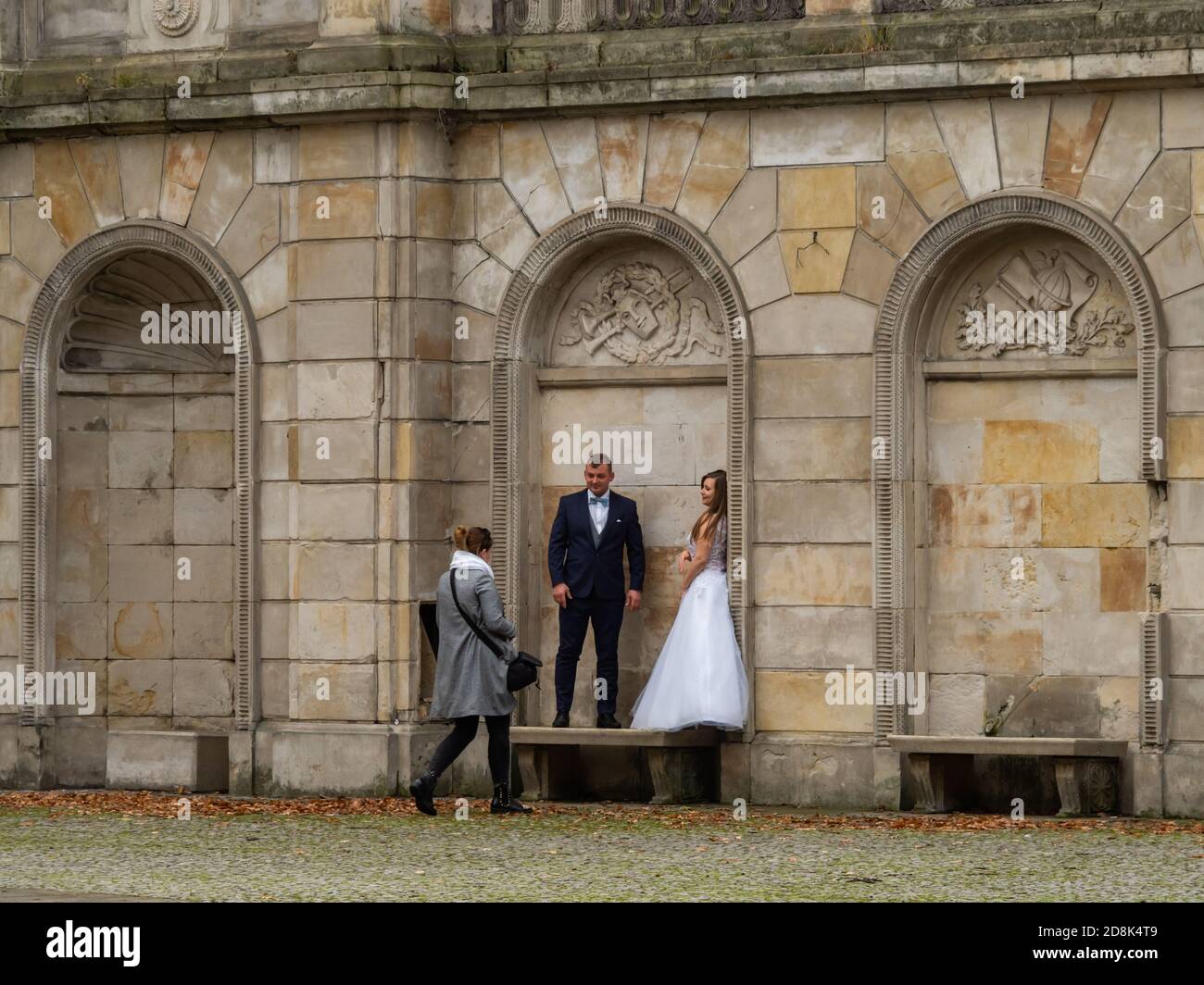 Warsaw, Poland - 29/10/2020 - photoshoot of young couples, just married in public park. Stock Photo