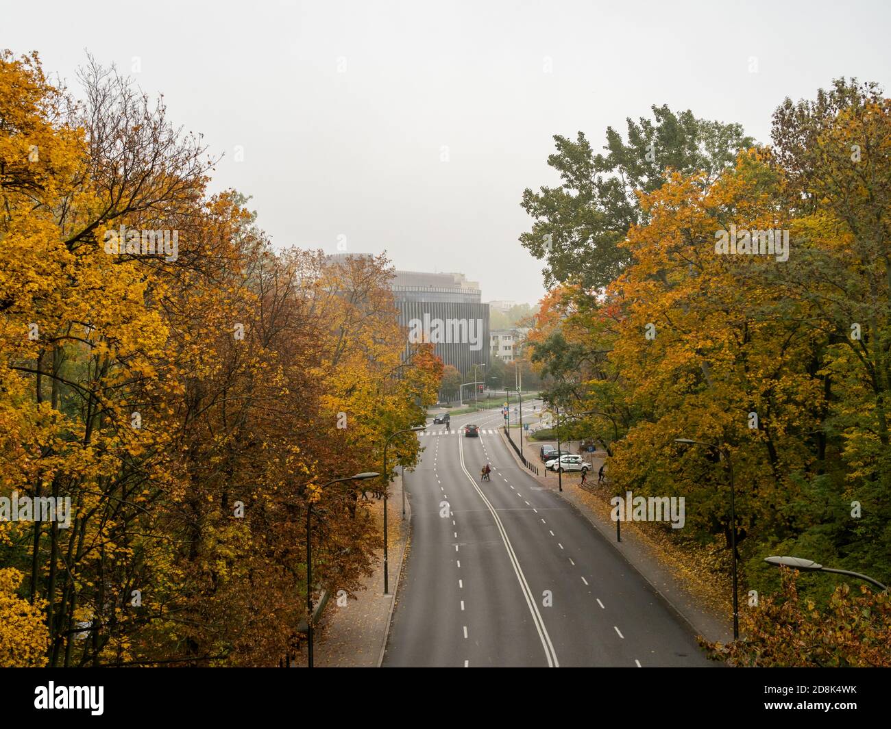 Warsaw/Poland - 25/10/2020 - almost empty street, few cars and people. Autumn time. Stock Photo