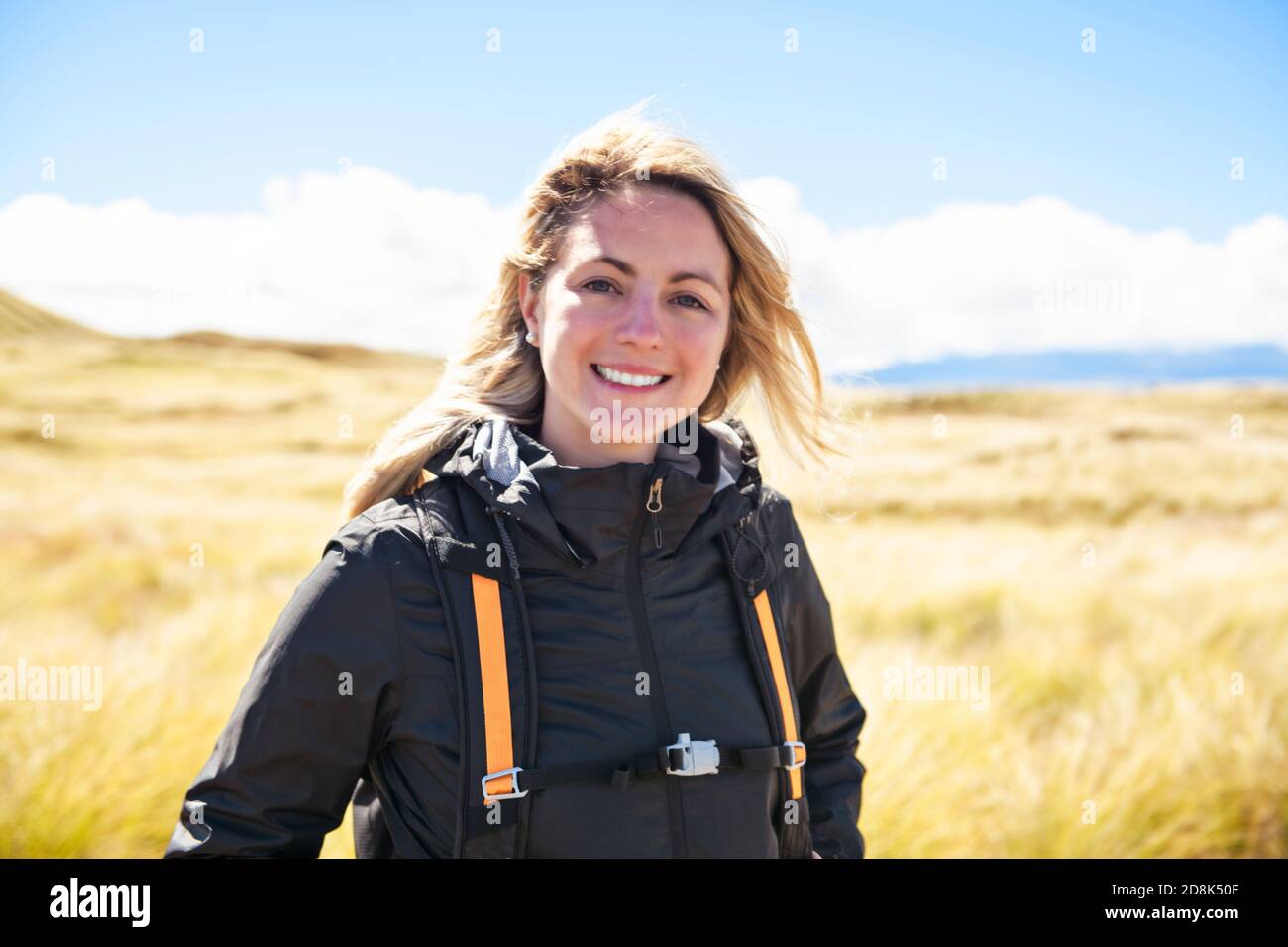 The Successful woman mountain hiker with backpack traveler caucasian ...