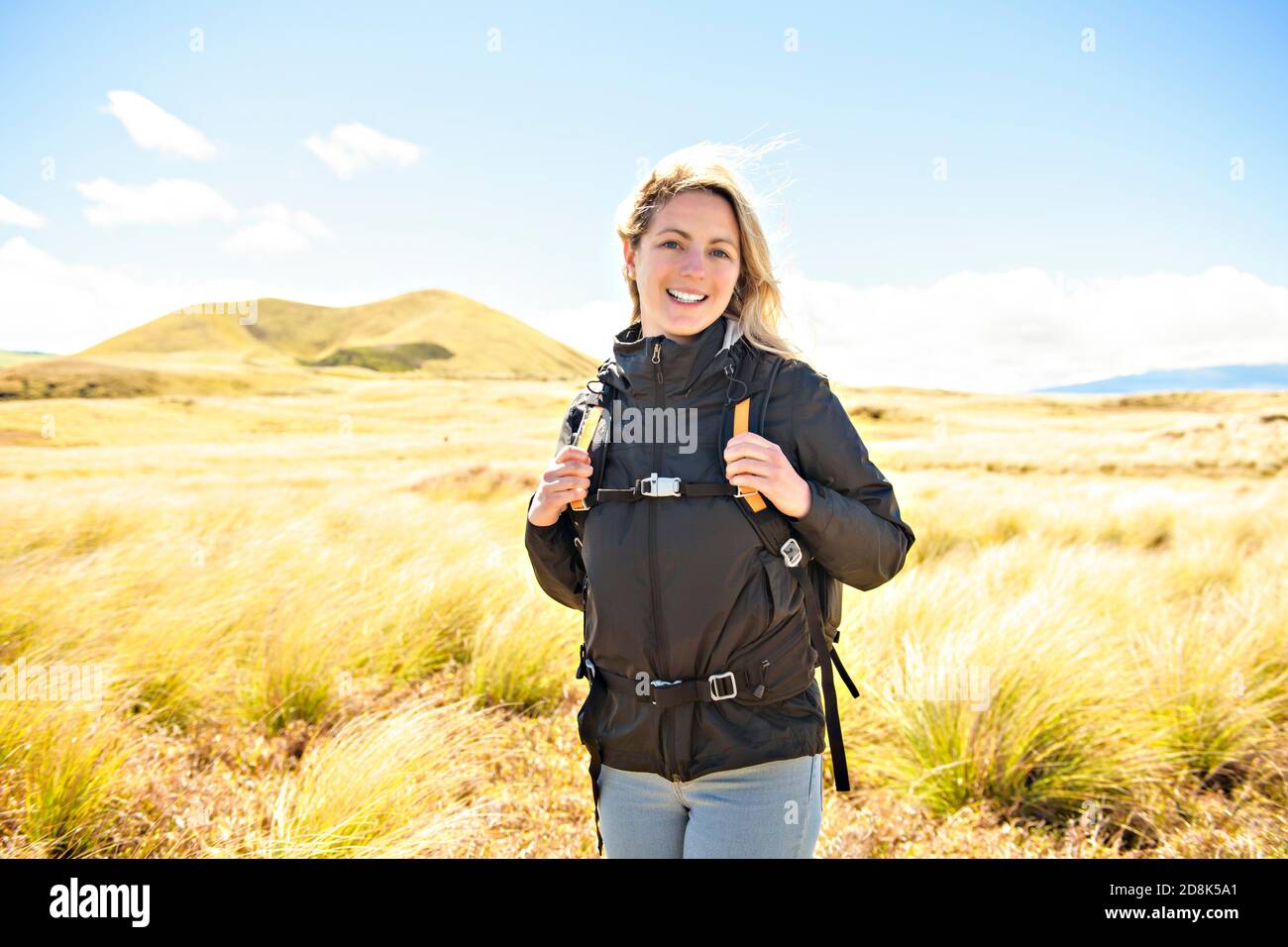 The Successful woman mountain hiker with backpack traveler caucasian ...