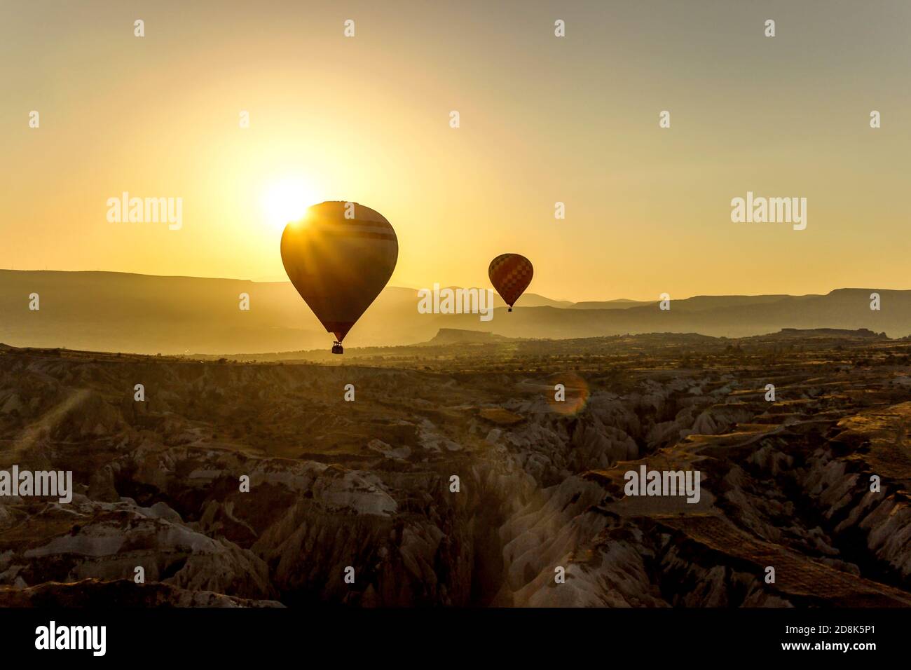 hot air balloons in sky at sunrise in Goreme Cappadocia Stock Photo