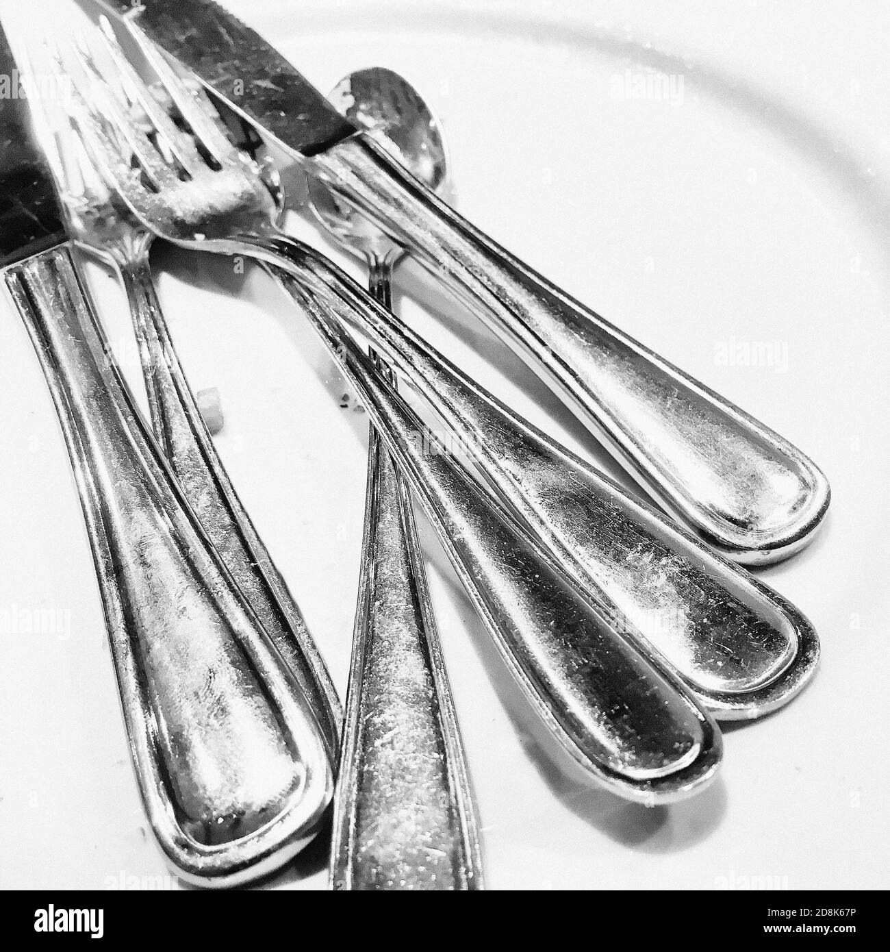 Cutlery on table Black and White Stock Photos & Images Alamy