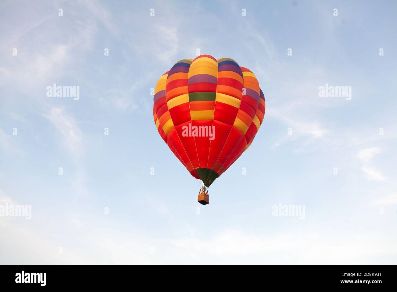 Colorful hot air balloon in blue sky Stock Photo - Alamy