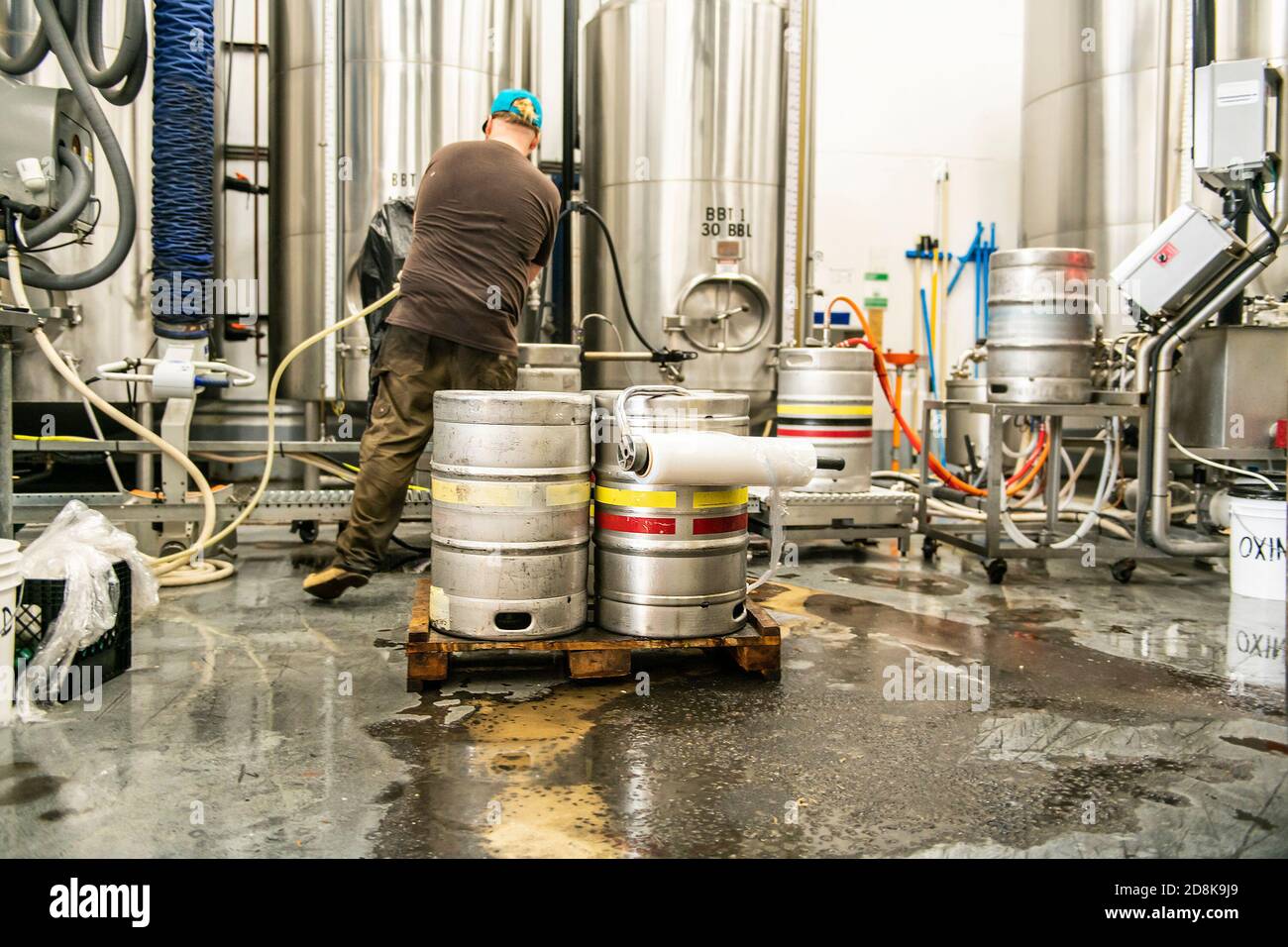 A Modern Beer Factory. Rows of steel tanks for beer fermentation and maturation Stock Photo Alamy