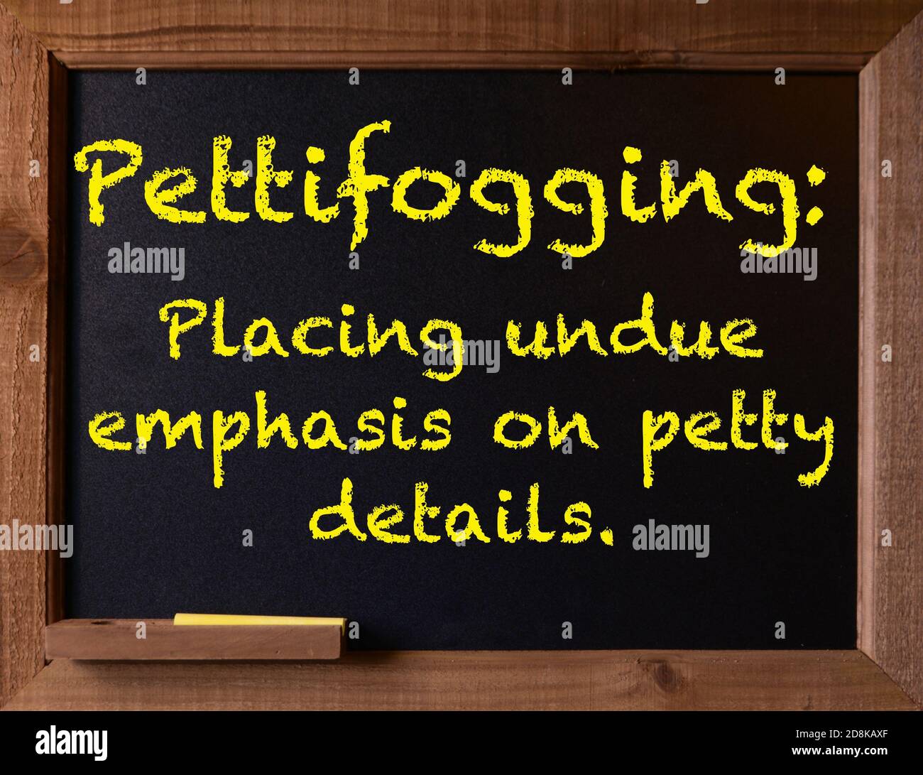 Chalkboard with word Pettifogging and definition Stock Photo