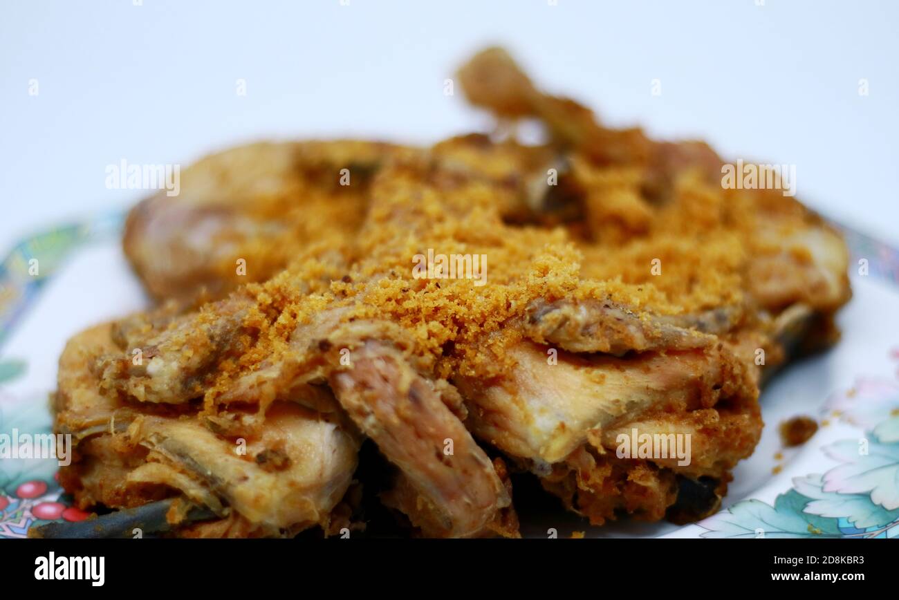 Fried Chicken With Crispy Spiced Flakes On White Background. Indonesian ...