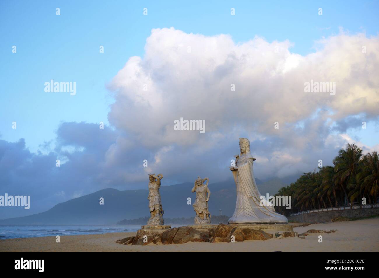 Three Buddha statues on the beach Stock Photo Alamy