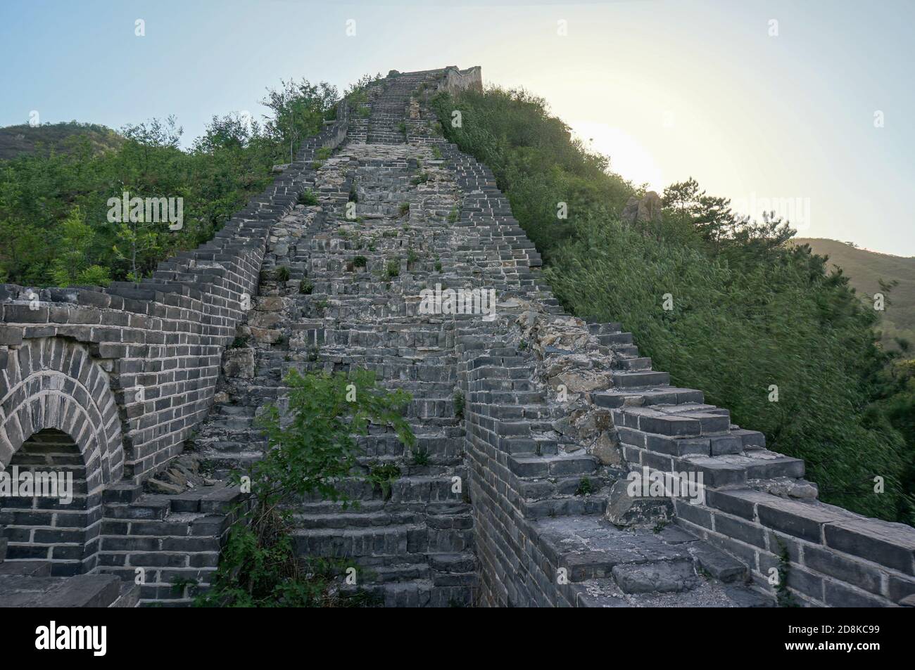 A part of the great wall of China. Stone stairs coming to the horizon Stock Photo