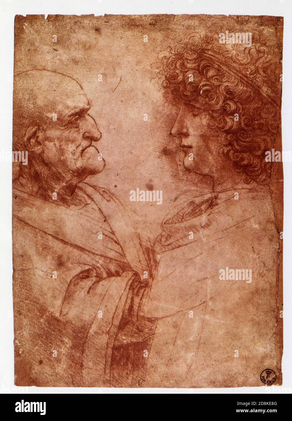Leorado da Vinci.Profiles of an old man and a youth.1495.red chalk. Stock Photo
