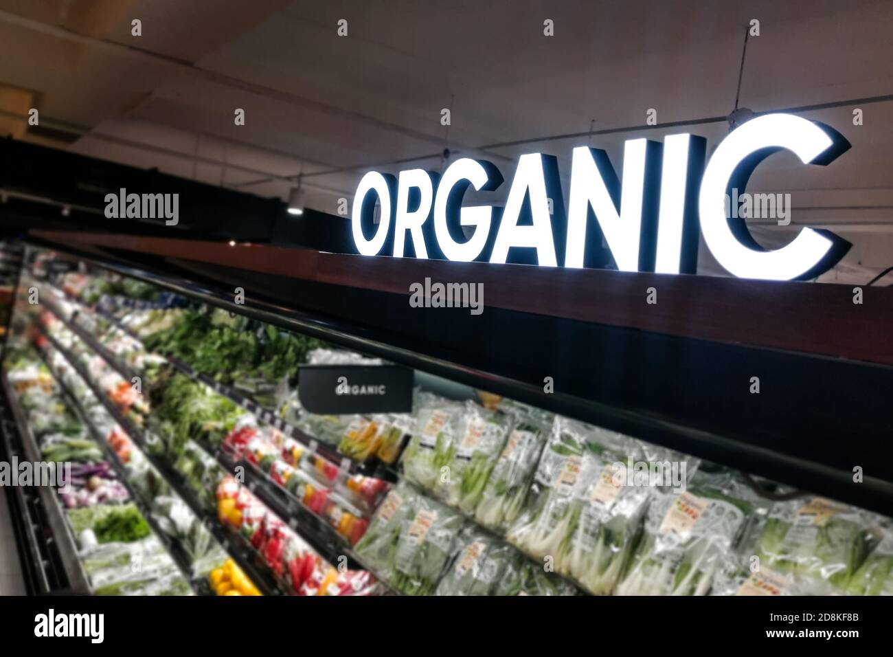 Organic produce vegetable fruits aisle with signage word in supermarket
