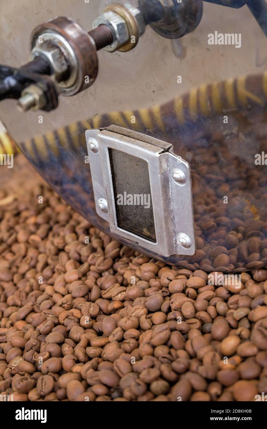 manual rolling drum coffee roaster Stock Photo - Alamy
